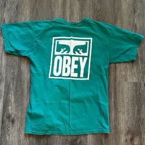 OBEY men’s graphic t-shirt in teal color
Size Large